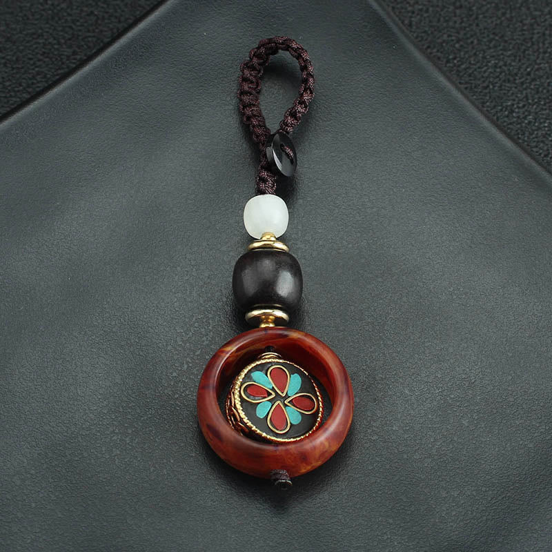 Buddha Stones Ebony Wood Sanskrit Four-leaf Clover Buddha's Eye Peace Rotatable Key Chain