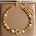 Buddha Stones Yellow Cat's Eye Stone Pearl Gourd Prosperity Bracelet