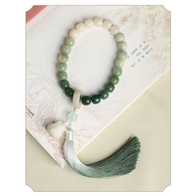 Buddha Stones Natural Gradient Bodhi Seed Fortune Money Bag Lotus Wisdom Tassel Wrist Mala