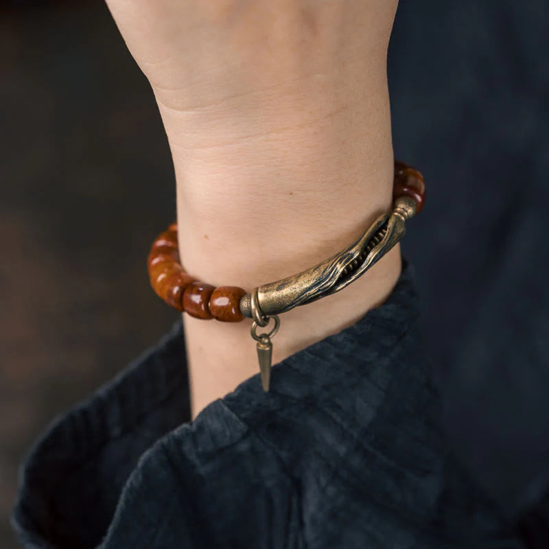 Buddha Stones Bone Beads Copper Cone Pendant Strength Bracelet