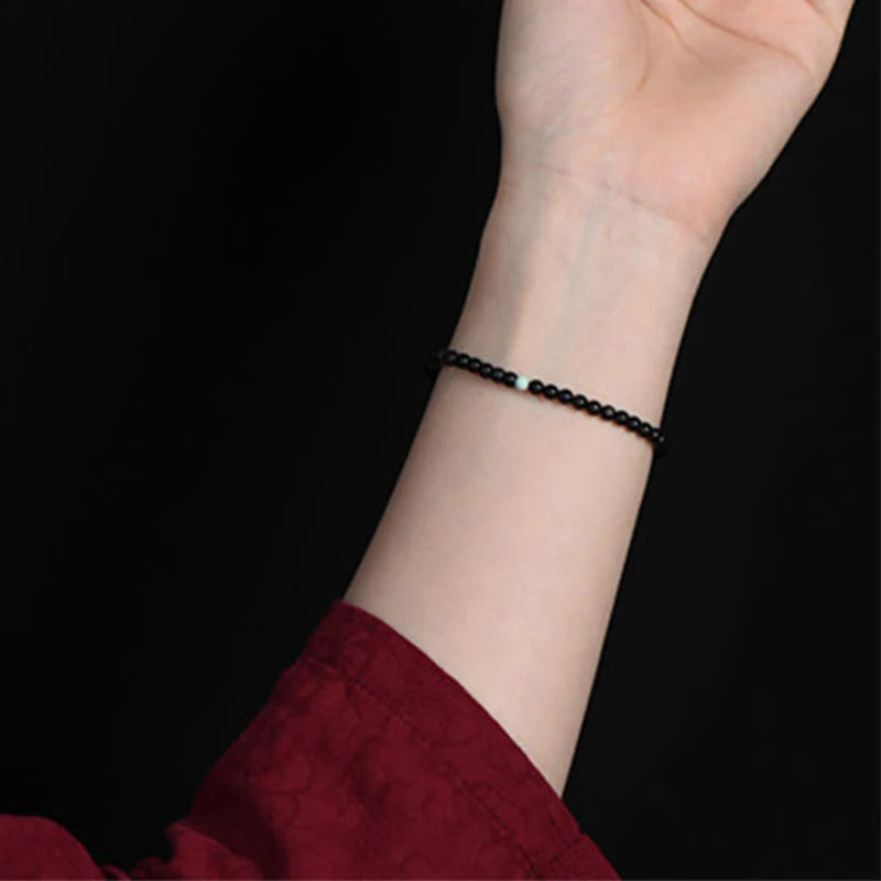 Buddha Stones Black Obsidian Turquoise Strength Fulfilment Bracelet