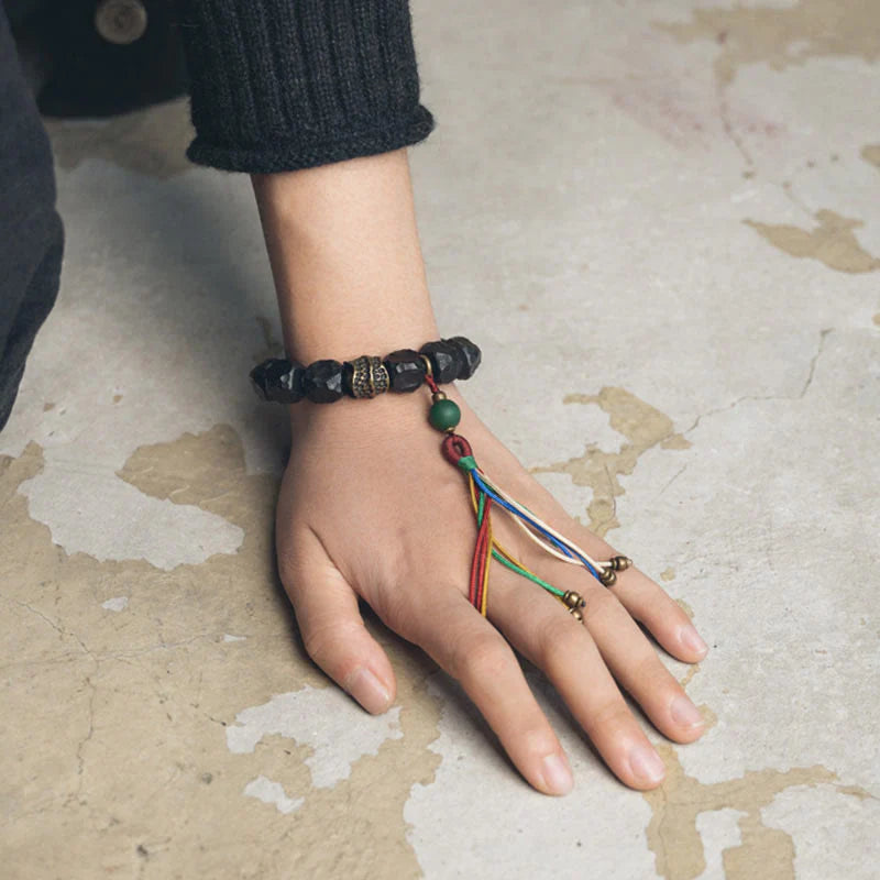 Buddha Stones Tibet Ebony Wood Copper Peace Tassel Wrist Mala Bracelet