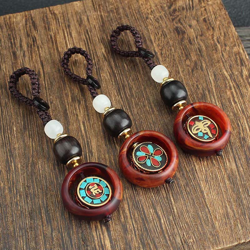 Buddha Stones Ebony Wood Sanskrit Four-leaf Clover Buddha's Eye Peace Rotatable Key Chain