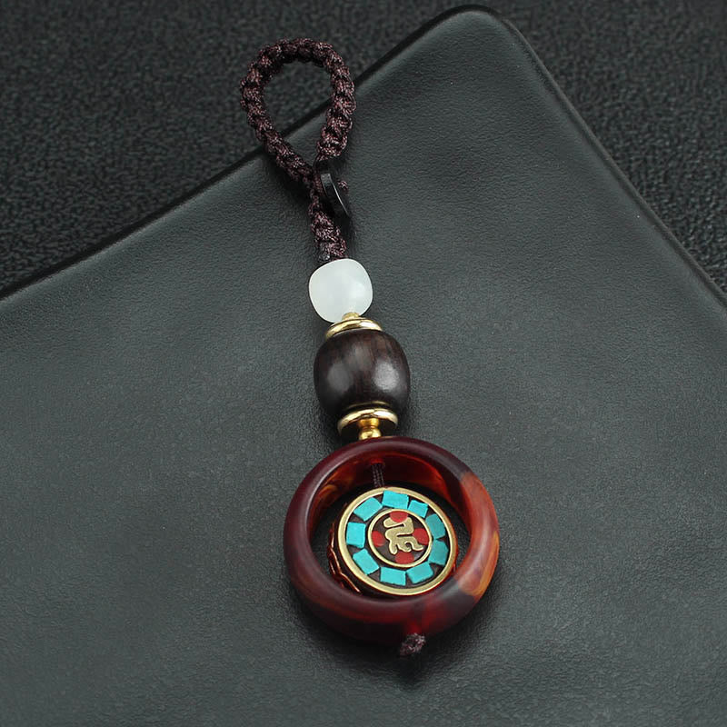 Buddha Stones Ebony Wood Sanskrit Four-leaf Clover Buddha's Eye Peace Rotatable Key Chain