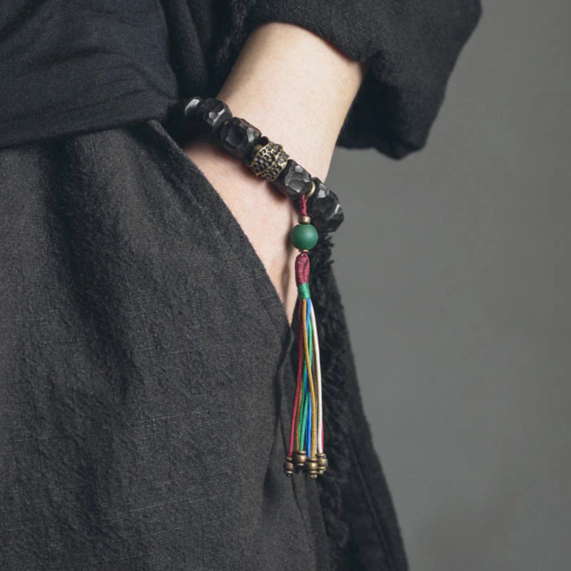 Buddha Stones Tibet Ebony Wood Copper Peace Tassel Wrist Mala Bracelet