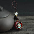 Buddha Stones Ebony Wood Sanskrit Four-leaf Clover Buddha's Eye Peace Rotatable Key Chain