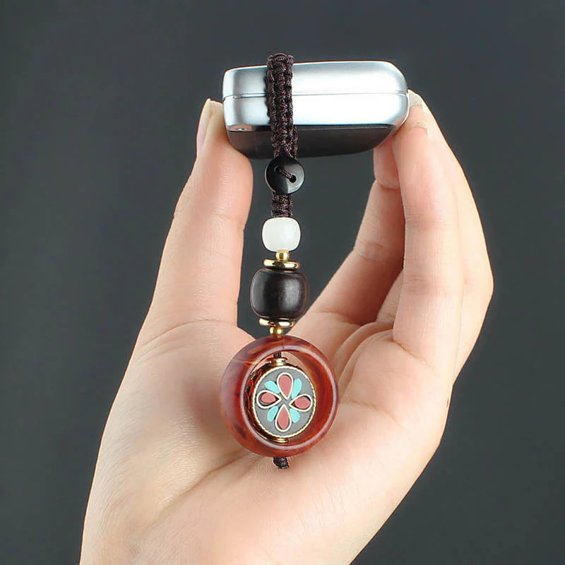 Buddha Stones Ebony Wood Sanskrit Four-leaf Clover Buddha's Eye Peace Rotatable Key Chain