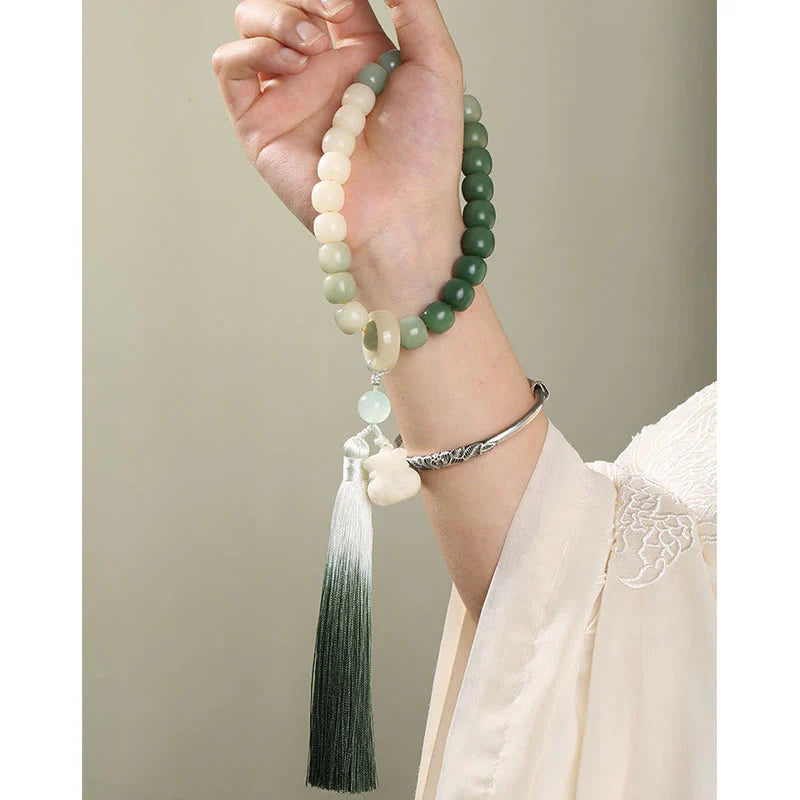 Buddha Stones Natural Gradient Bodhi Seed Fortune Money Bag Lotus Wisdom Tassel Wrist Mala