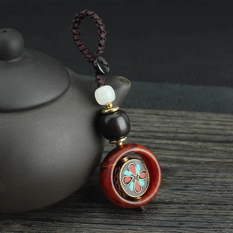 Buddha Stones Ebony Wood Sanskrit Four-leaf Clover Buddha's Eye Peace Rotatable Key Chain