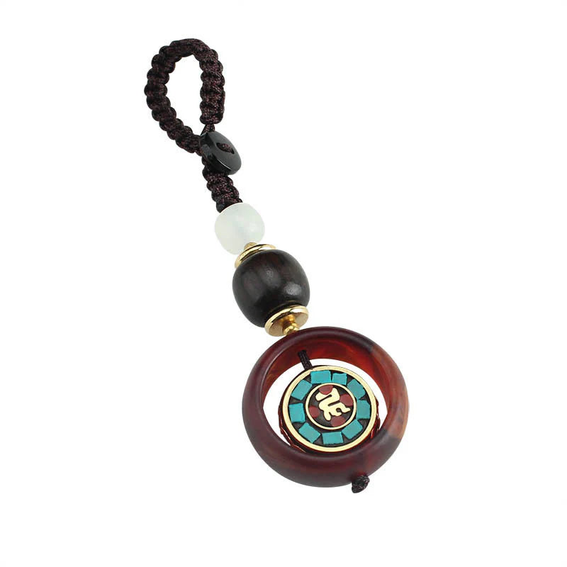 Buddha Stones Ebony Wood Sanskrit Four-leaf Clover Buddha's Eye Peace Rotatable Key Chain